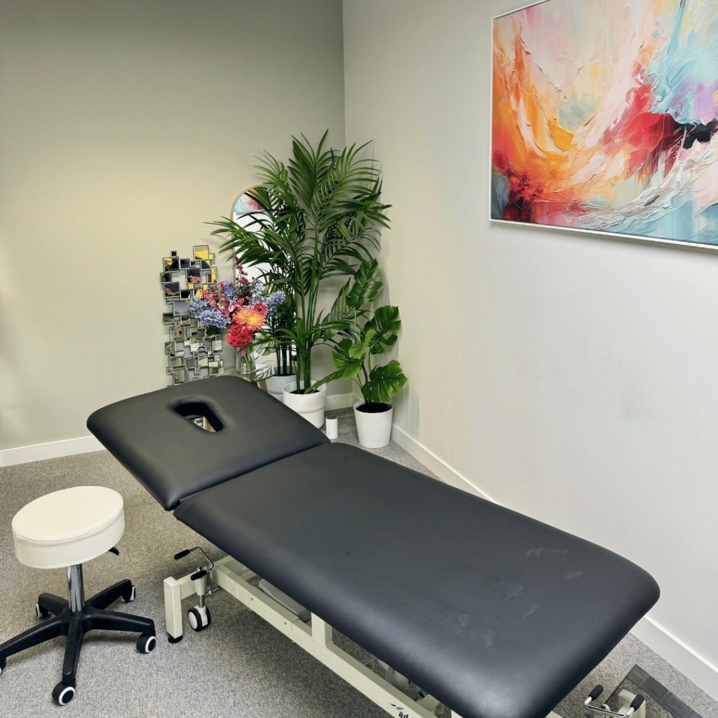 Second view of modern chiropractic treatment area near London Victoria.