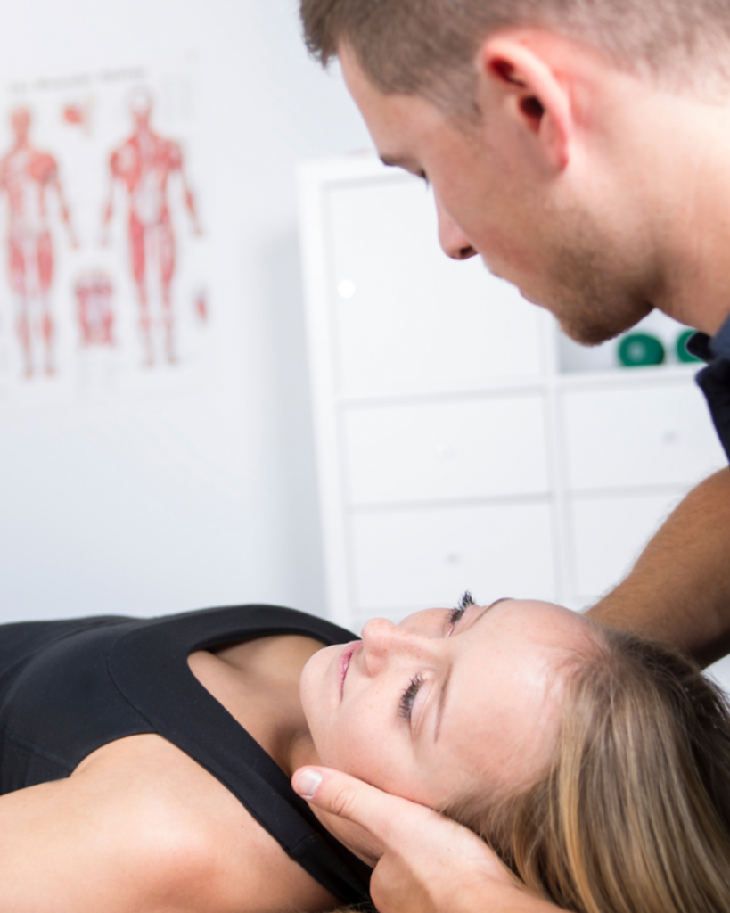 Wandsworth chiropractor adjusting the neck of a a patient at Battersea and Chelsea chiropractic