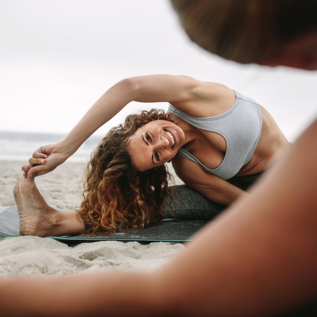 Happy Woman Stretching after seeing Top London Chiropractor a Chiropractor in Chelsea at Battersea and Chelsea Chiropractic