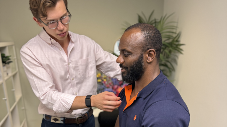 Battersea Chiropractor helping to fix a patient poor posture at Battersea and Chelsea Chiropractic