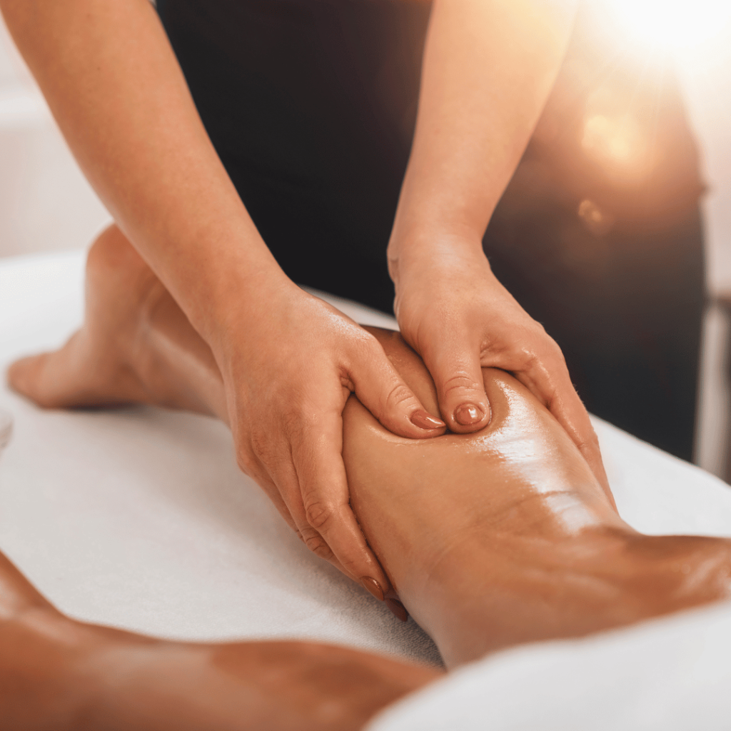 Client at Battersea Chelsea Chiropractic Clinic getting an advanced leg sports massage.